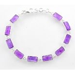 A 925 silver bracelet set with faceted amethysts, L. 18cm.