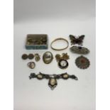A small group of costume jewellery and silver thruppenny pieces.