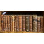 Fifteen half leatherbound volumes of mixed 19th/early 20th century subjects and authors.