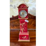 An early 20th century continental miniature gilt porcelain longcase clock, H. 41cm.