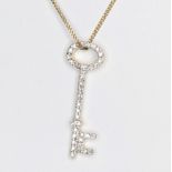 A 18ct yellow gold round diamonds totalling an estimated 0.30 cts set key pendant. the key