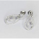 A set of 18ct white gold fancy twist earrings with Approx. 0.60 cts round brilliant cut diamonds