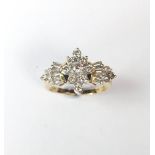 A 18ct yellow gold Diamond Fan cluster style ring. This ring consists of 9 round cut diamonds in the