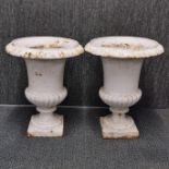 A pair of cold painted cast iron garden urns, Dia. 35cm, H. 43cm.