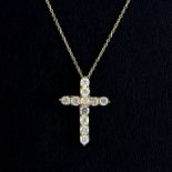 A 14ct yellow gold cross pendant and chain set with brilliant cut diamonds, approx. 2ct overall,