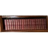 Twenty half leatherbound volumes of the International library of famous literature issued by The