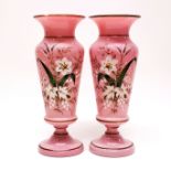 A pair of 19th century hand enamelled pink opaline glass vases, H. 29cm (one A/F to rim).