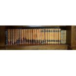 Seven half leatherbound volumes of Varlds Kriget I Bild together with eighteen half leatherbound