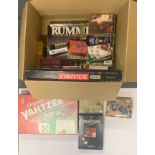 A quantity of vintage playing cards and board games.