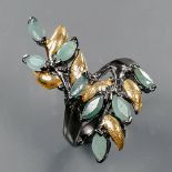 A 925 silver gilt ring set with marquise cut emeralds, (N).