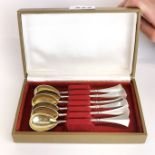 a boxed set of six Russian 84 stamped silver cream spoons with gilt bowls, spoon L. 13.5cm.