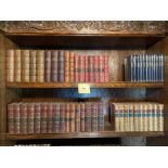 A large group of half leatherbound books, largest H. 21cm.