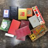 A quantity of vintage playing cards and games.
