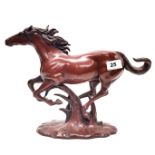 A lovely patinated bronze figure of a galloping horse, L. 36cm, H. 27cm