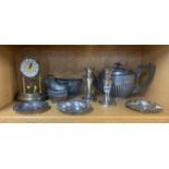 A quantity of silver plated items with a torsion mantle clock.