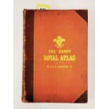 A large half leather bound volume of The Handy Royal Atlas, 1915.