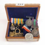 A group of medals (Malaya medal for 406605 L A C, GW Martin RAF, and other for 91290 S P R. RW
