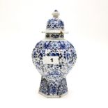 An 18th century Dutch tin glazed Delft Pottery vase and lid, H. 24cm.