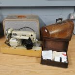 Two vintage sewing machines and a box of sewing items.