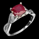 A 925 silver ring set with a cushion cut ruby and white stone set shoulders, (N).