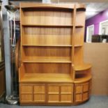 A large teak Nathan unit comprising of a bookshelf and corner unit, bookshelf 193 x 102cm.