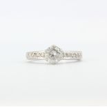 A hallmarked 18ct white gold ring set with a large brilliant cut diamond, approx. 1ct, with