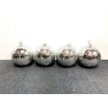 Four small glitterballs, Dia. 22cm.