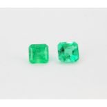 Two unmounted square cut Columbian emeralds, approx. 4ct total.