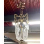 A heavy quality brass and cut glass ceiling light fitting, H. 70cm.