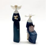 Two Lladro porcelain figurines of nuns, tallest H. 27cm.