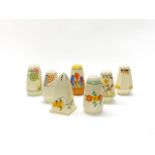 A group of Clarice Cliff, Crown Devon and other Art Deco sugar shakers, H. 12cm.