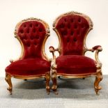 A pair of 19th century carved mahogany ladies' and gentleman's chairs.