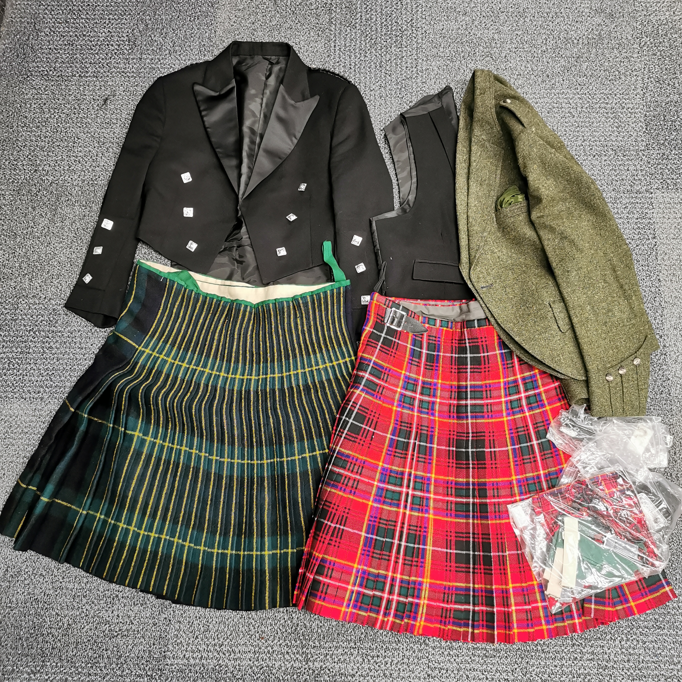 Two high quality gentleman's kilts with formal uniform jackets, buckles and Sgian Dubhs.