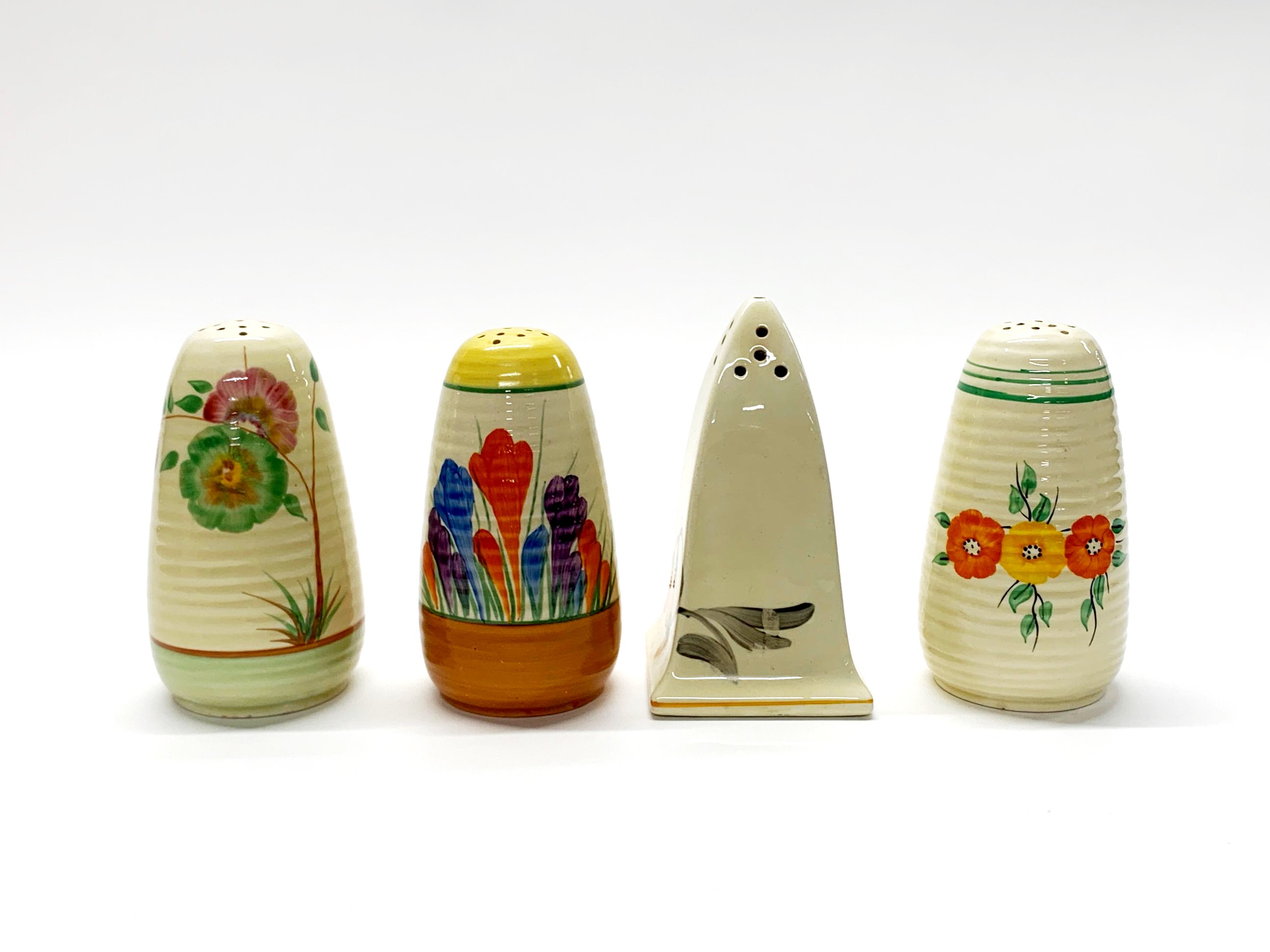 A group of Clarice Cliff, Crown Devon and other Art Deco sugar shakers, H. 12cm. - Image 3 of 3