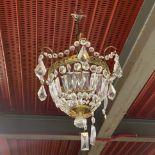 A pair of gilt brass and crystal light fittings, Dia. 26cm, H. 26cm.