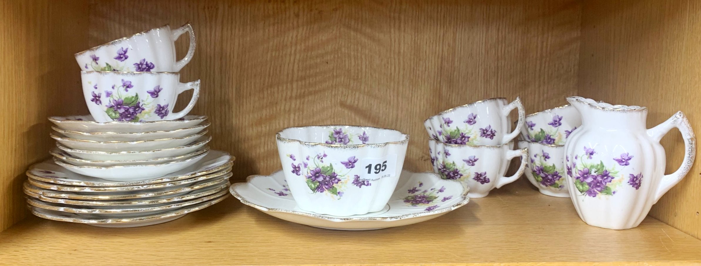 A very pretty Victorian Melba china tea set, decorated with violets, complete six settings.