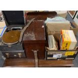 Two portable wind up record players with a mahogany case of records and further LP's and singles.