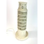 An unusual 1970's resin table lamp of the Leaning Tower of Pisa, illuminated from the inside, H.