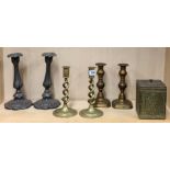 Two pairs of 19th century brass candlesticks, with a pair of spelter candlesticks and a brass