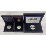 A boxed limited edition enamelled hallmarked silver sapphire jubillee coin, together with two five