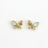 A pair of 9ct yellow gold butterfly stud earrings set with moonstones and diamonds, L. 0.7cm.