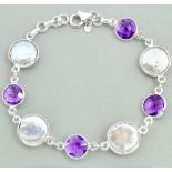 A 925 silver bracelet set with baroque pearls and amethysts, L. 19cm.