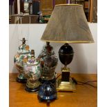 A Tiffany style tortoise table lamp and four others.