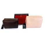 An unused brown leather Osprey, London pouch, together with a BNWT Cognac washbag and blush wash