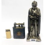 A vintage knight table lighter, H. 24cm, and two others.