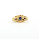 An antique Edwardian 18ct yellow gold sapphire and diamond set ring, (K.5).