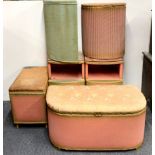 A pair of 1930's Loom style bedside cabinets with two linen chests and baskets.