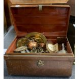 An antique metal trunk and contents