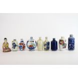 An interesting group of nine Chinese porcelain snuff bottles, tallest H. 9cm.