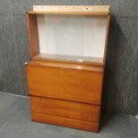 A three piece wall mounted 1970's set of mahogany cabinets, 83 x 37 x 37cm.